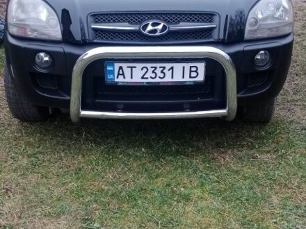 Чорний Хендай Туксон, об'ємом двигуна 2 л та пробігом 185 тис. км за 8300 $, фото 1 на Automoto.ua