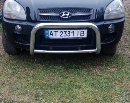 Чорний Хендай Туксон, об'ємом двигуна 2 л та пробігом 185 тис. км за 8300 $, фото 1 на Automoto.ua