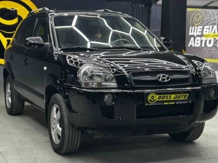 Черный Хендай Туксон, объемом двигателя 2 л и пробегом 224 тыс. км за 7800 $, фото 1 на Automoto.ua