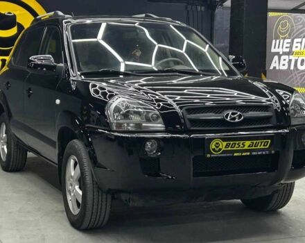 Черный Хендай Туксон, объемом двигателя 2 л и пробегом 224 тыс. км за 7800 $, фото 1 на Automoto.ua