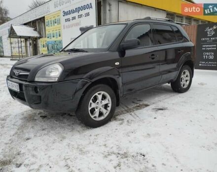 Черный Хендай Туксон, объемом двигателя 2 л и пробегом 169 тыс. км за 8600 $, фото 1 на Automoto.ua