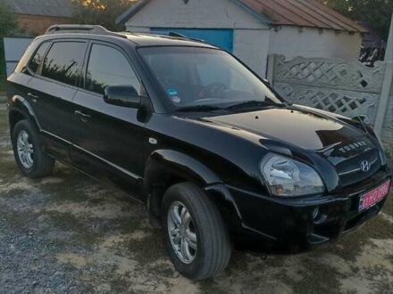 Чорний Хендай Туксон, об'ємом двигуна 1.98 л та пробігом 175 тис. км за 8600 $, фото 1 на Automoto.ua