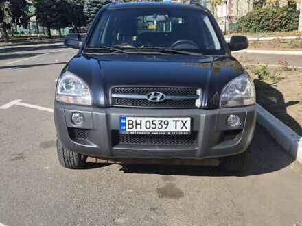 Чорний Хендай Туксон, об'ємом двигуна 1.98 л та пробігом 93 тис. км за 11800 $, фото 1 на Automoto.ua