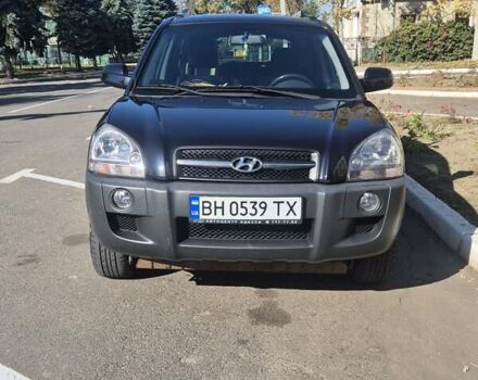 Черный Хендай Туксон, объемом двигателя 1.98 л и пробегом 93 тыс. км за 11800 $, фото 1 на Automoto.ua