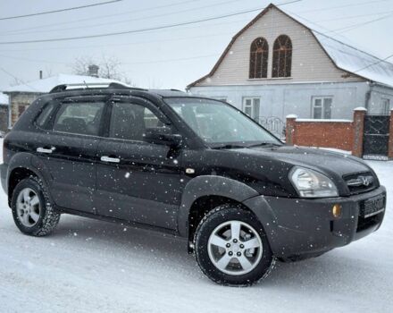 Черный Хендай Туксон, объемом двигателя 2 л и пробегом 175 тыс. км за 8699 $, фото 1 на Automoto.ua