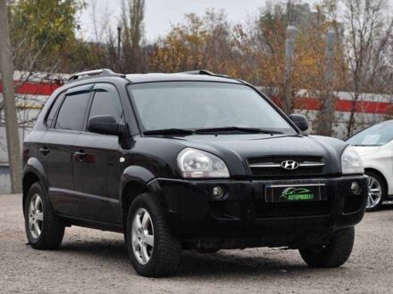 Чорний Хендай Туксон, об'ємом двигуна 2 л та пробігом 204 тис. км за 8650 $, фото 1 на Automoto.ua