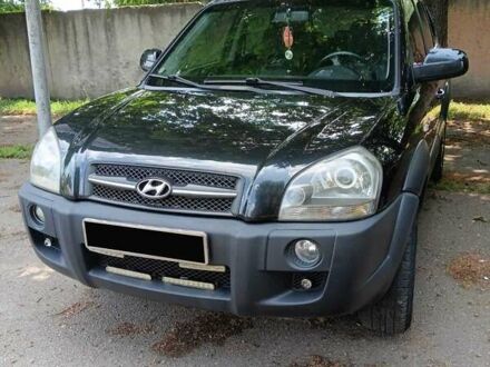 Чорний Хендай Туксон, об'ємом двигуна 1.98 л та пробігом 202 тис. км за 7700 $, фото 1 на Automoto.ua