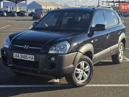 Чорний Хендай Туксон, об'ємом двигуна 1.98 л та пробігом 212 тис. км за 7766 $, фото 1 на Automoto.ua