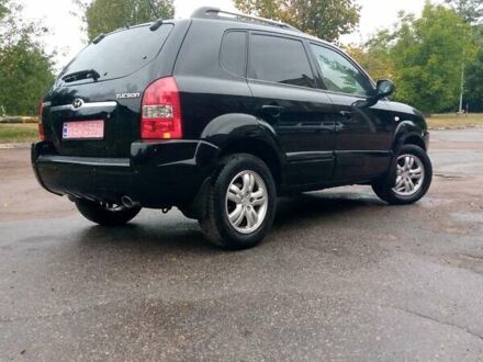 Чорний Хендай Туксон, об'ємом двигуна 2 л та пробігом 225 тис. км за 7850 $, фото 1 на Automoto.ua