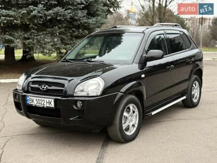 Чорний Хендай Туксон, об'ємом двигуна 1.99 л та пробігом 240 тис. км за 7200 $, фото 1 на Automoto.ua