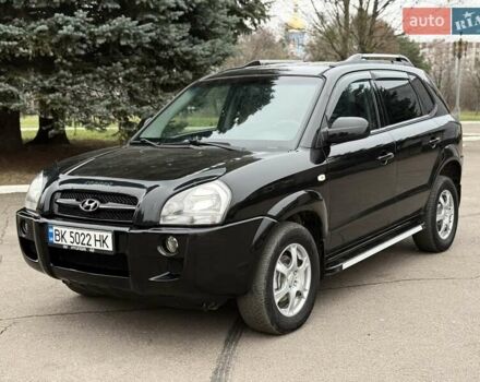 Черный Хендай Туксон, объемом двигателя 1.99 л и пробегом 240 тыс. км за 7200 $, фото 1 на Automoto.ua