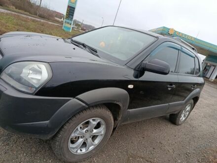 Чорний Хендай Туксон, об'ємом двигуна 2 л та пробігом 276 тис. км за 8500 $, фото 1 на Automoto.ua