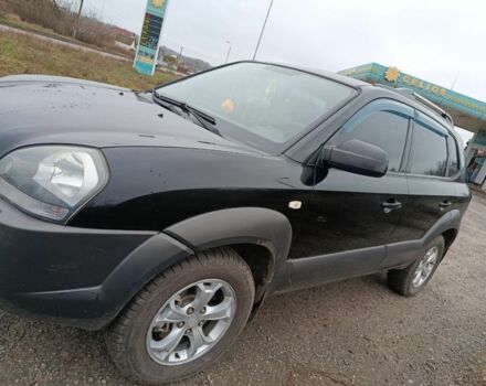 Черный Хендай Туксон, объемом двигателя 2 л и пробегом 276 тыс. км за 8500 $, фото 1 на Automoto.ua