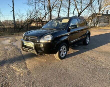 Черный Хендай Туксон, объемом двигателя 2 л и пробегом 205 тыс. км за 8400 $, фото 1 на Automoto.ua