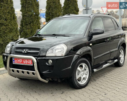 Черный Хендай Туксон, объемом двигателя 2 л и пробегом 209 тыс. км за 9300 $, фото 1 на Automoto.ua