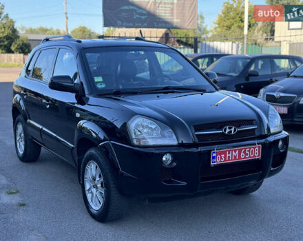 Черный Хендай Туксон, объемом двигателя 2 л и пробегом 242 тыс. км за 7800 $, фото 1 на Automoto.ua