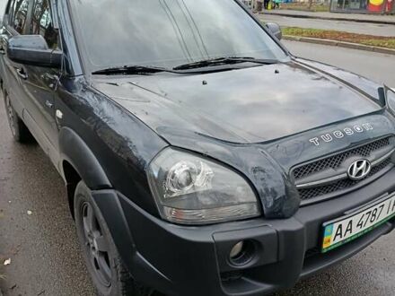 Черный Хендай Туксон, объемом двигателя 1.98 л и пробегом 271 тыс. км за 9200 $, фото 1 на Automoto.ua