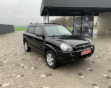 Черный Хендай Туксон, объемом двигателя 2 л и пробегом 198 тыс. км за 7500 $, фото 1 на Automoto.ua