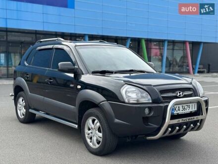 Черный Хендай Туксон, объемом двигателя 1.98 л и пробегом 202 тыс. км за 8350 $, фото 1 на Automoto.ua