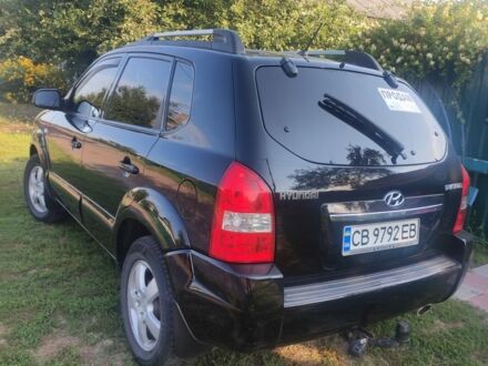 Чорний Хендай Туксон, об'ємом двигуна 2 л та пробігом 180 тис. км за 9200 $, фото 1 на Automoto.ua