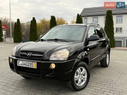Черный Хендай Туксон, объемом двигателя 1.98 л и пробегом 239 тыс. км за 8700 $, фото 1 на Automoto.ua