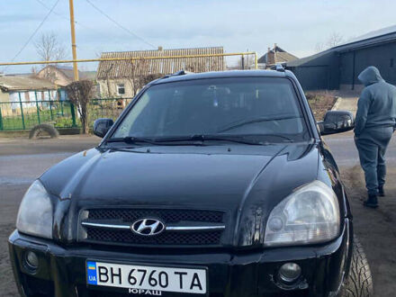 Черный Хендай Туксон, объемом двигателя 1.98 л и пробегом 260 тыс. км за 8500 $, фото 1 на Automoto.ua