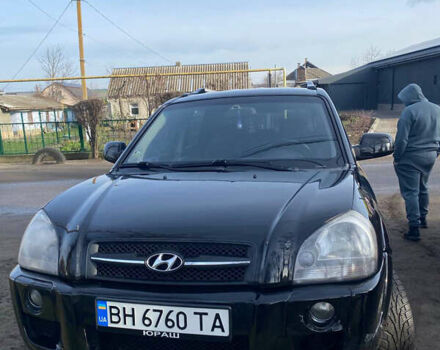 Черный Хендай Туксон, объемом двигателя 1.98 л и пробегом 260 тыс. км за 8500 $, фото 1 на Automoto.ua