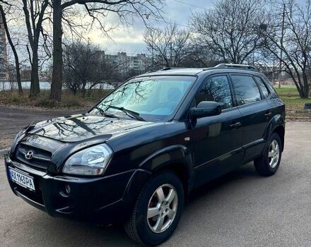 Черный Хендай Туксон, объемом двигателя 2 л и пробегом 215 тыс. км за 6700 $, фото 1 на Automoto.ua