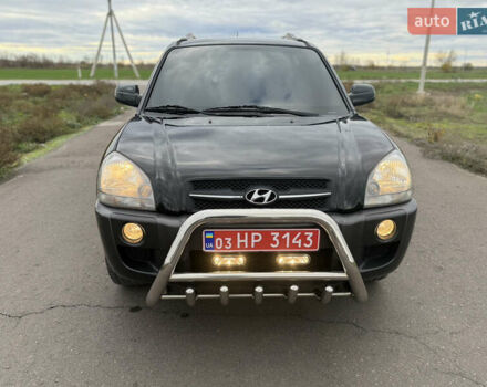 Черный Хендай Туксон, объемом двигателя 2 л и пробегом 257 тыс. км за 7700 $, фото 1 на Automoto.ua