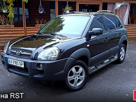 Черный Хендай Туксон, объемом двигателя 2 л и пробегом 188 тыс. км за 8800 $, фото 1 на Automoto.ua
