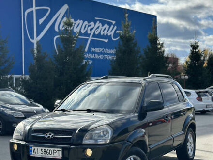 Черный Хендай Туксон, объемом двигателя 2 л и пробегом 300 тыс. км за 8300 $, фото 1 на Automoto.ua