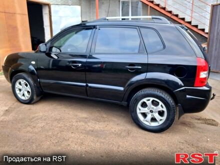 Чорний Хендай Туксон, об'ємом двигуна 2 л та пробігом 208 тис. км за 7500 $, фото 1 на Automoto.ua