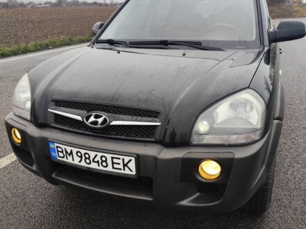 Черный Хендай Туксон, объемом двигателя 2 л и пробегом 277 тыс. км за 9000 $, фото 1 на Automoto.ua