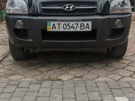 Чорний Хендай Туксон, об'ємом двигуна 2 л та пробігом 163 тис. км за 8100 $, фото 1 на Automoto.ua