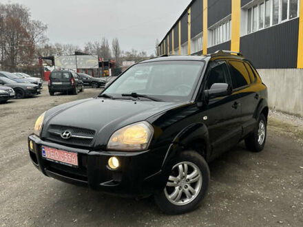 Чорний Хендай Туксон, об'ємом двигуна 2 л та пробігом 243 тис. км за 7999 $, фото 1 на Automoto.ua