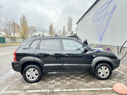 Черный Хендай Туксон, объемом двигателя 2.7 л и пробегом 294 тыс. км за 9950 $, фото 1 на Automoto.ua