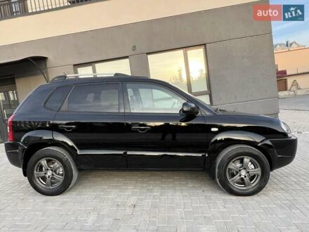 Чорний Хендай Туксон, об'ємом двигуна 1.98 л та пробігом 185 тис. км за 8500 $, фото 1 на Automoto.ua