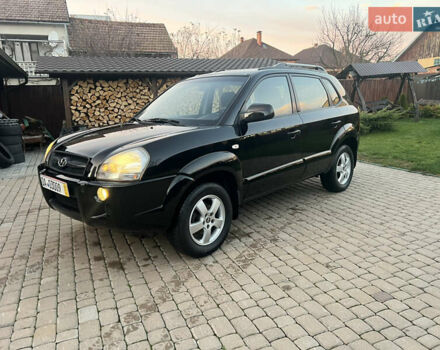 Черный Хендай Туксон, объемом двигателя 2 л и пробегом 276 тыс. км за 7450 $, фото 1 на Automoto.ua