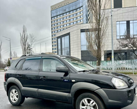 Черный Хендай Туксон, объемом двигателя 1.98 л и пробегом 238 тыс. км за 8499 $, фото 1 на Automoto.ua