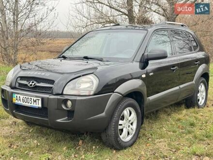 Черный Хендай Туксон, объемом двигателя 2 л и пробегом 148 тыс. км за 9500 $, фото 1 на Automoto.ua