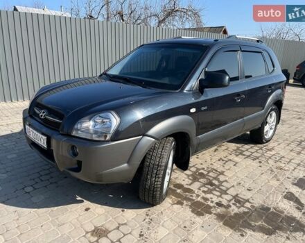 Черный Хендай Туксон, объемом двигателя 1.98 л и пробегом 108 тыс. км за 9500 $, фото 1 на Automoto.ua