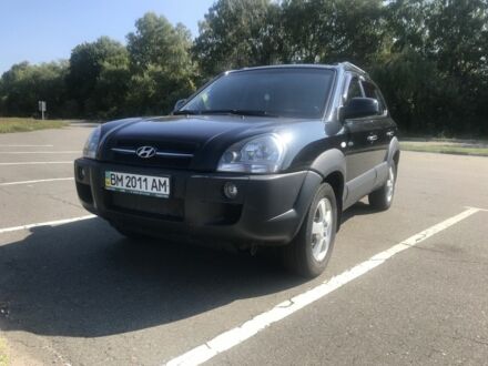Чорний Хендай Туксон, об'ємом двигуна 2 л та пробігом 192 тис. км за 8700 $, фото 1 на Automoto.ua
