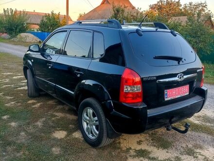 Черный Хендай Туксон, объемом двигателя 2 л и пробегом 175 тыс. км за 8300 $, фото 1 на Automoto.ua