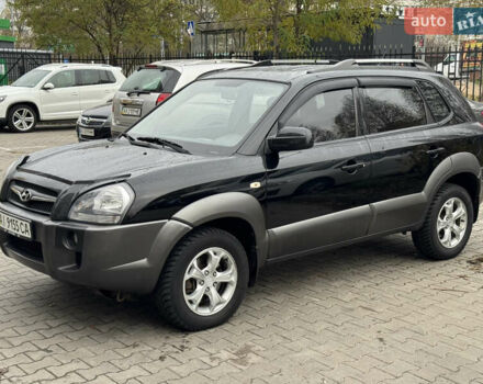 Черный Хендай Туксон, объемом двигателя 2 л и пробегом 157 тыс. км за 8900 $, фото 1 на Automoto.ua