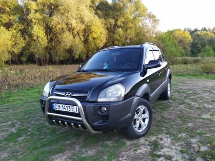 Черный Хендай Туксон, объемом двигателя 2 л и пробегом 162 тыс. км за 8500 $, фото 1 на Automoto.ua