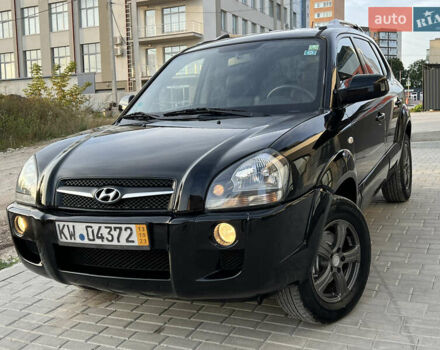 Чорний Хендай Туксон, об'ємом двигуна 1.98 л та пробігом 185 тис. км за 7199 $, фото 1 на Automoto.ua