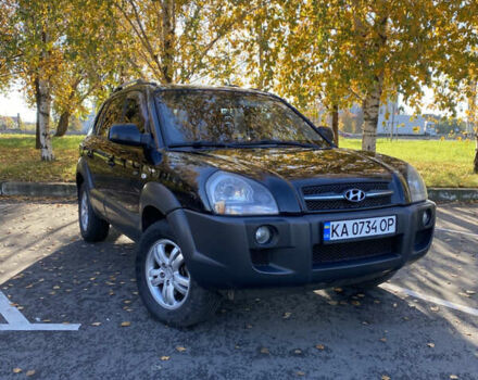 Черный Хендай Туксон, объемом двигателя 1.98 л и пробегом 218 тыс. км за 7200 $, фото 1 на Automoto.ua