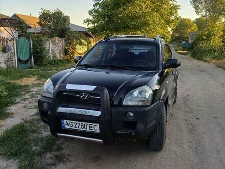 Черный Хендай Туксон, объемом двигателя 1.98 л и пробегом 189 тыс. км за 7800 $, фото 1 на Automoto.ua