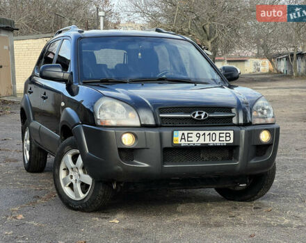 Черный Хендай Туксон, объемом двигателя 2 л и пробегом 240 тыс. км за 8500 $, фото 1 на Automoto.ua