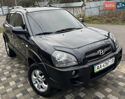 Черный Хендай Туксон, объемом двигателя 1.98 л и пробегом 271 тыс. км за 8300 $, фото 1 на Automoto.ua